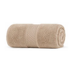 Beige towel with textured band for neutral bathroom, spa and hospitality collections