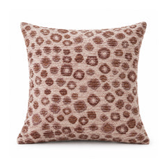 Primeval muted mauve rose and chocolate brown cushion cover featuring irregular leopard-inspired animal spots