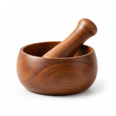Rounded wooden mortar and pestle set in warm brown wood with visible grain, deep bowl and stout pestle on white background