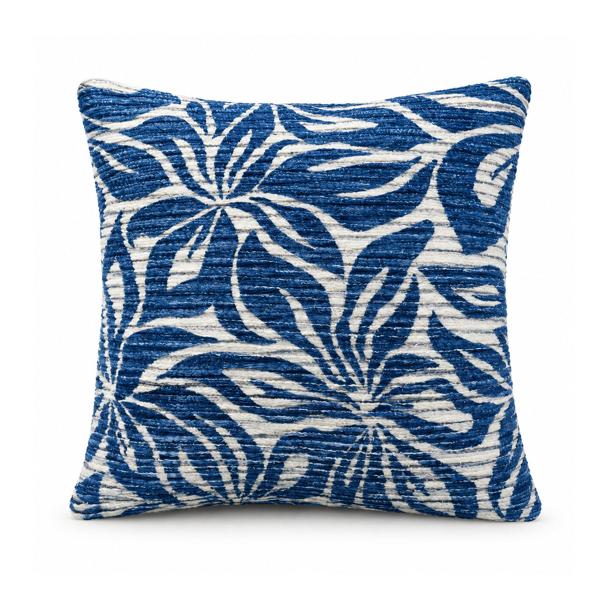 Primeval royal blue and ivory cushion featuring expressive tropical palm leaves and radiating botanical fronds
