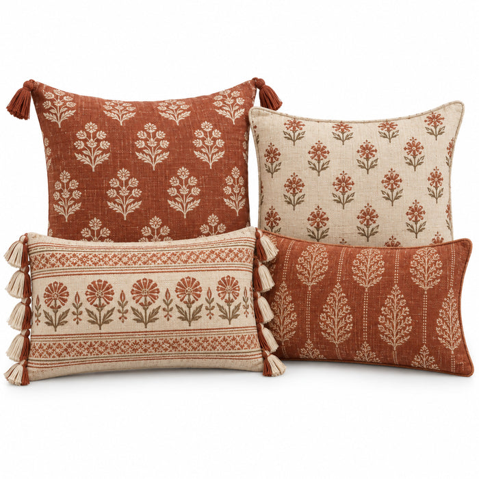 Assorted rust and ivory decorative cushion set with coordinated floral and geometric prints