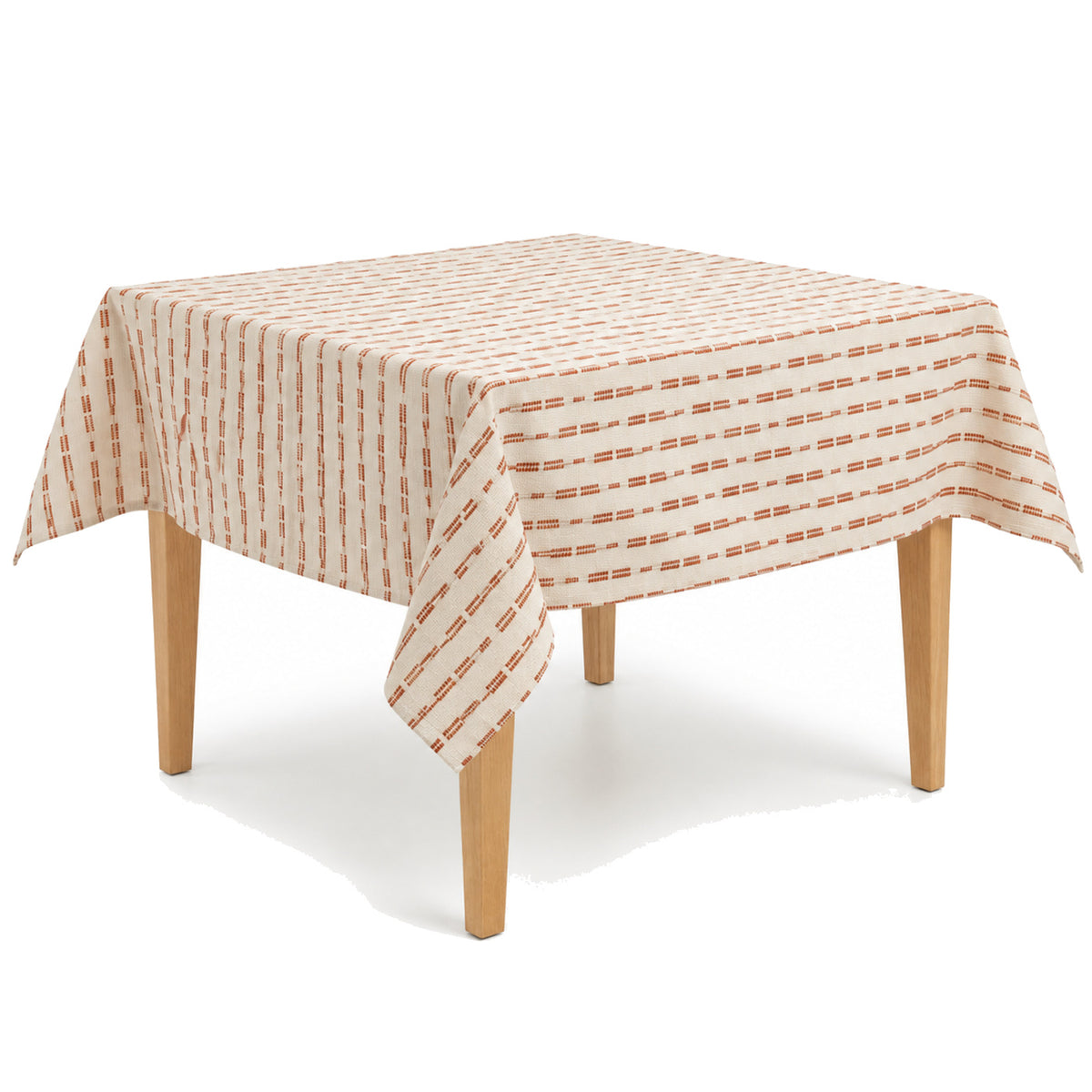 Primeval rust ivory broken stripe tablecloth displayed on a square dining table