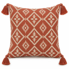 Rust decorative cushion cover with ivory diamond geometric pattern and corner tassels