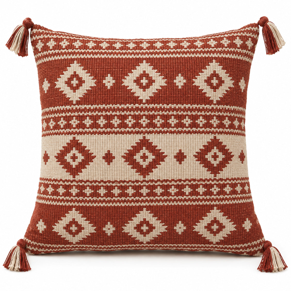 Rust and ivory decorative cushion with geometric pattern and corner tassels