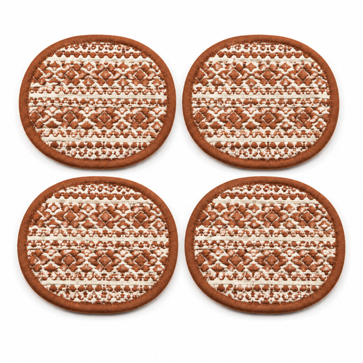 Rust ivory rounded geometric coaster set on a clean white background