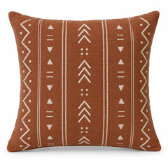 Rust decorative cushion cover with ivory tribal line and arrow motifs