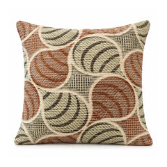 Primeval rust brown olive green and cream cushion with overlapping circular swirls and retro geometric arcs