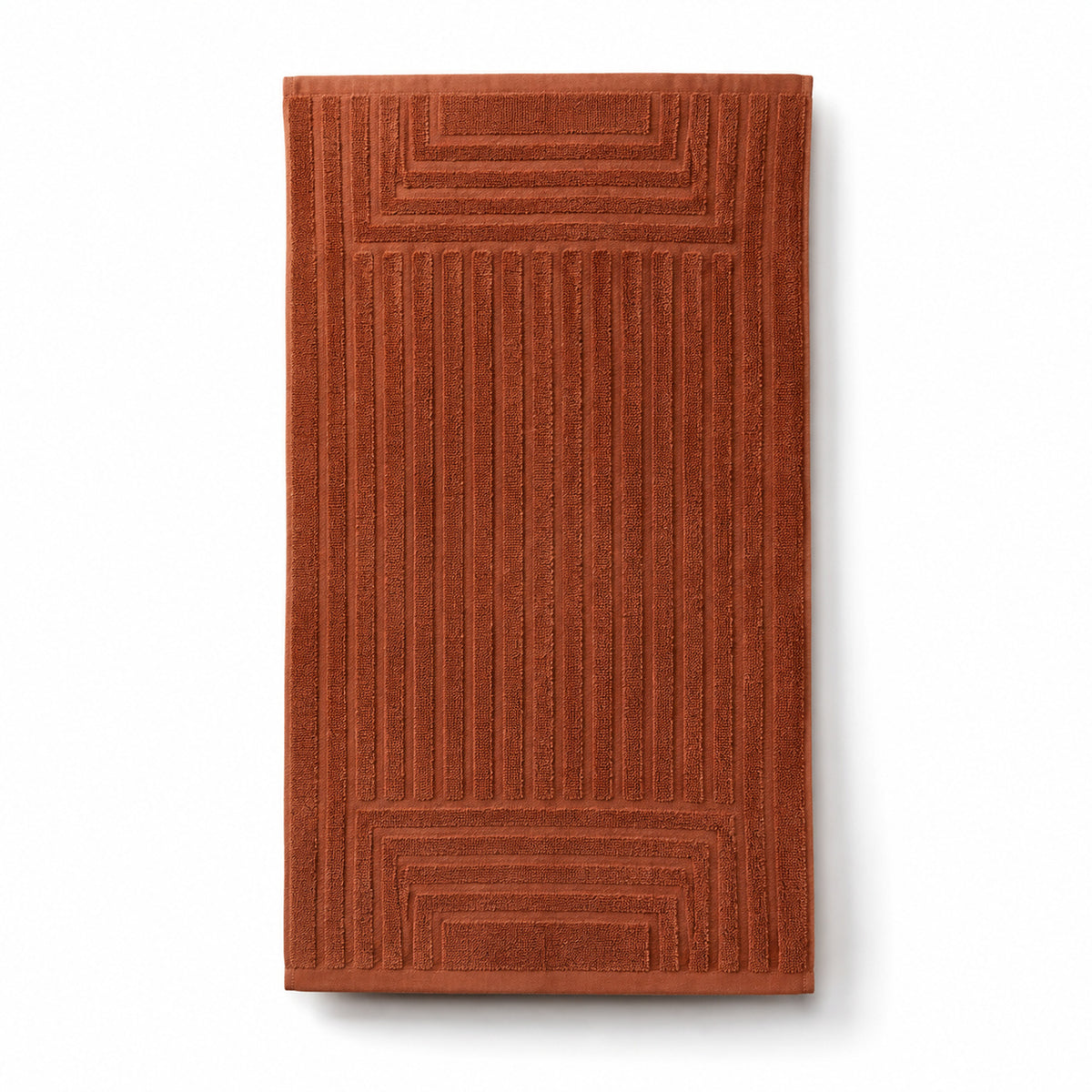 Rust orange sculpted linear cotton terry bath towel 70x140 cm for architectural hotel and spa linen
