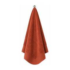 Rust terry towel for warm contemporary bathroom and hospitality collections