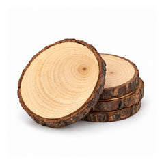 Four round wood-slice coasters with pale tree rings and rugged bark edges, three stacked with one displayed upright