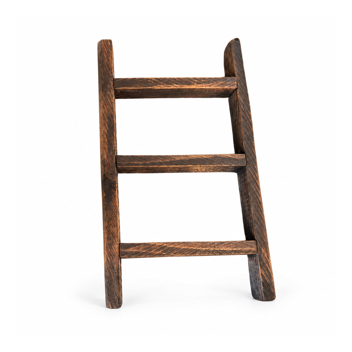 Rustic dark-brown wooden ladder with three horizontal rungs, tapered side rails and a weathered grain finish