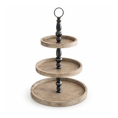Rustic three-tier round wooden display stand with weathered grey-brown trays, black turned spindle and top ring handle