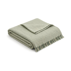 Sage green herringbone woven cotton throw with fringe 130×170 cm by Primeval