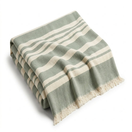 Sage green and ivory broad stripe woven cotton throw with fringe 130×170 cm by Primeval