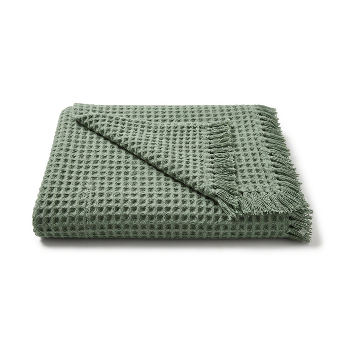 Sage green open waffle weave cotton throw with fringe 130×170 cm by Primeval