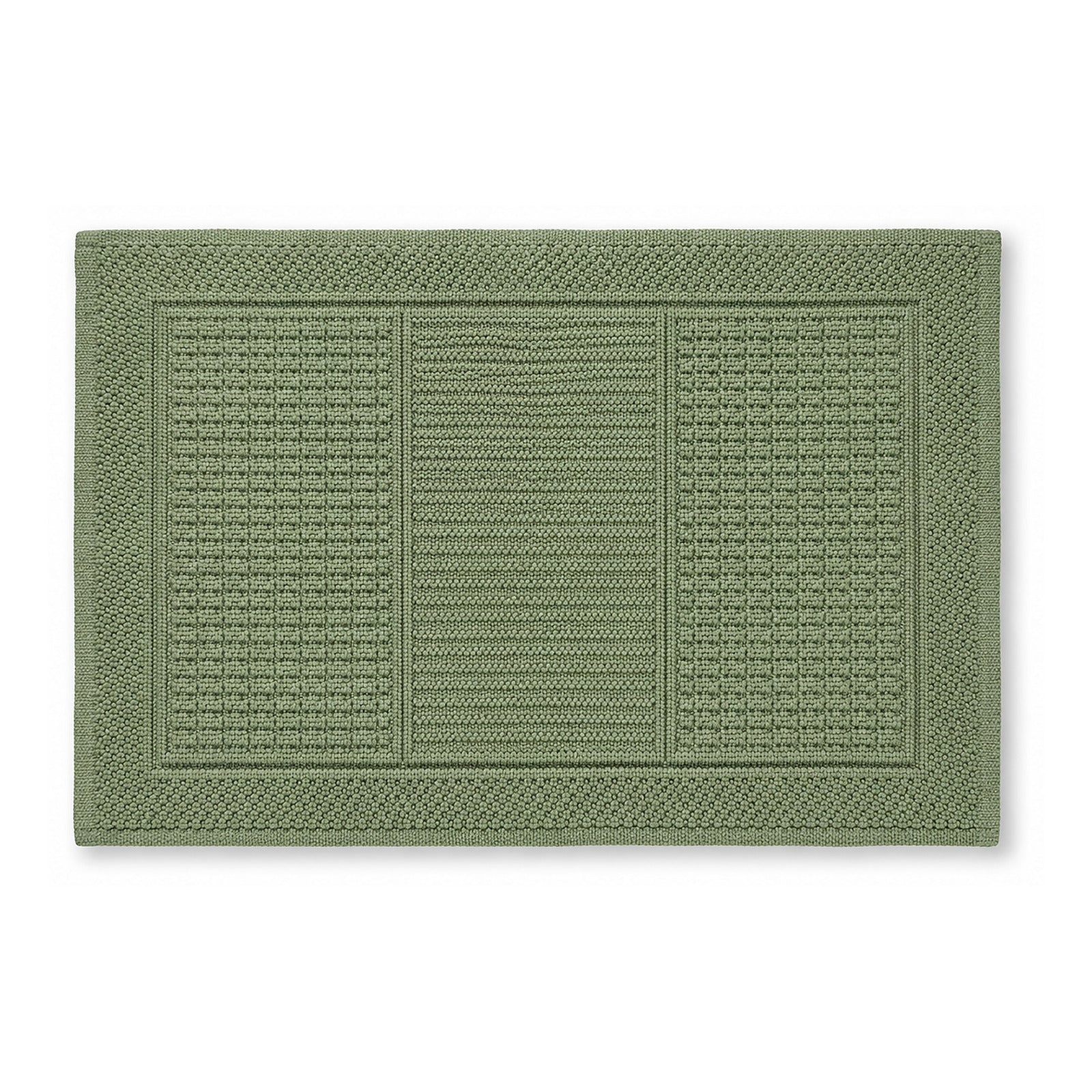 Sage green textured bath mat with framed woven panel design on white background