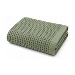 Sage green waffle textured towel for modern spa and bathroom collections