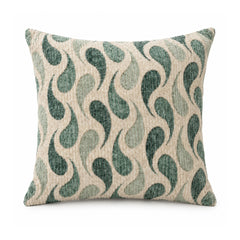 Primeval sage olive and deep teal cushion with repeating curved S-wave motifs on a pale neutral background