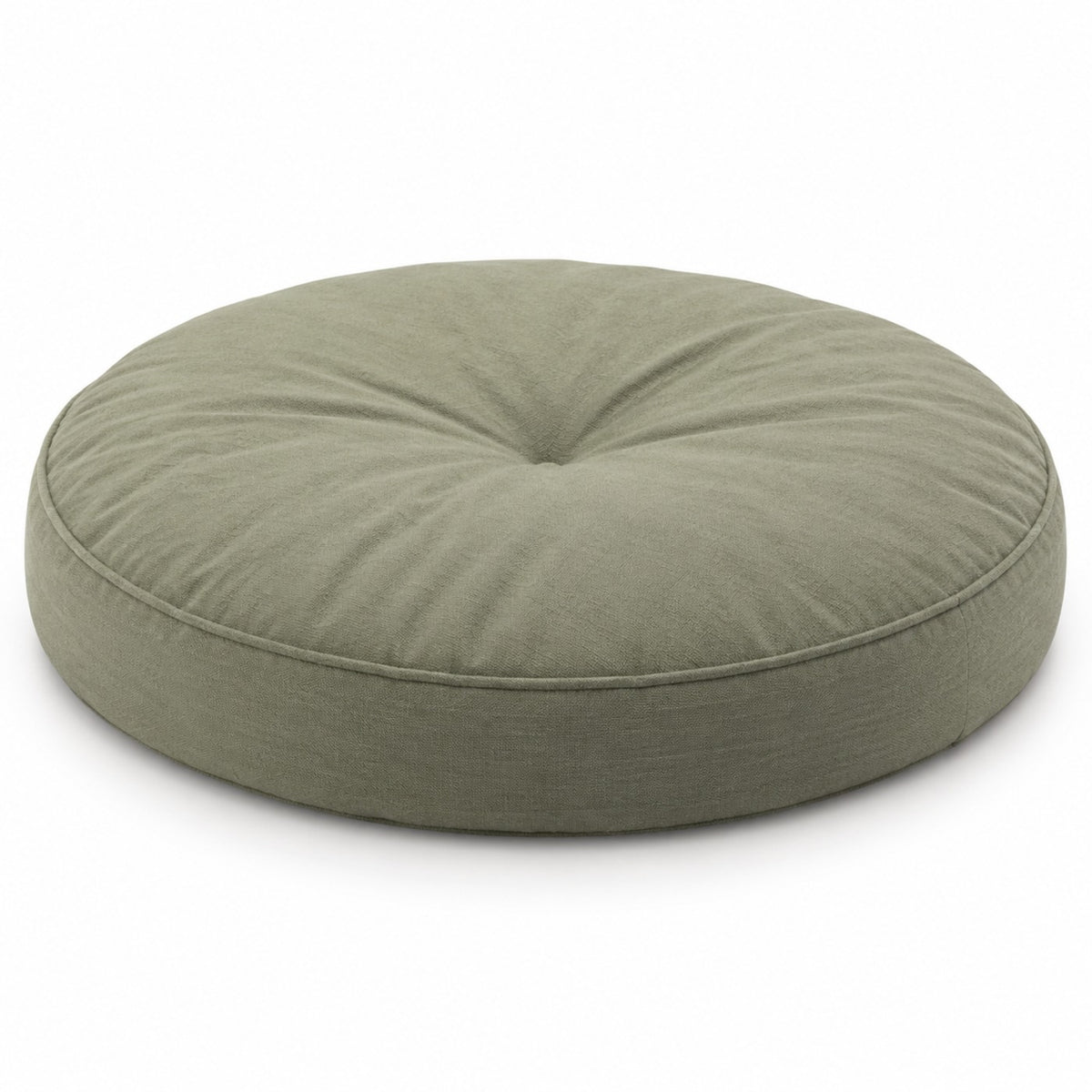 Sage green round floor cushion with central tufting on white background