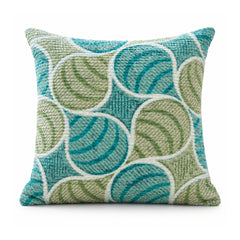 Primeval sage green and turquoise blue decorative cushion cover with overlapping circles and leaf-like spiral curves