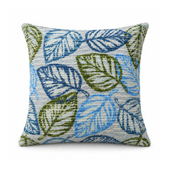 Primeval decorative throw cushion with sky blue and sage green botanical leaves on a light background, shown against a white background