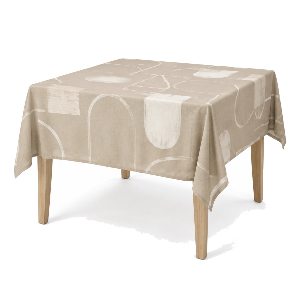 Primeval soft greige ivory abstract tablecloth displayed on a rectangular dining table