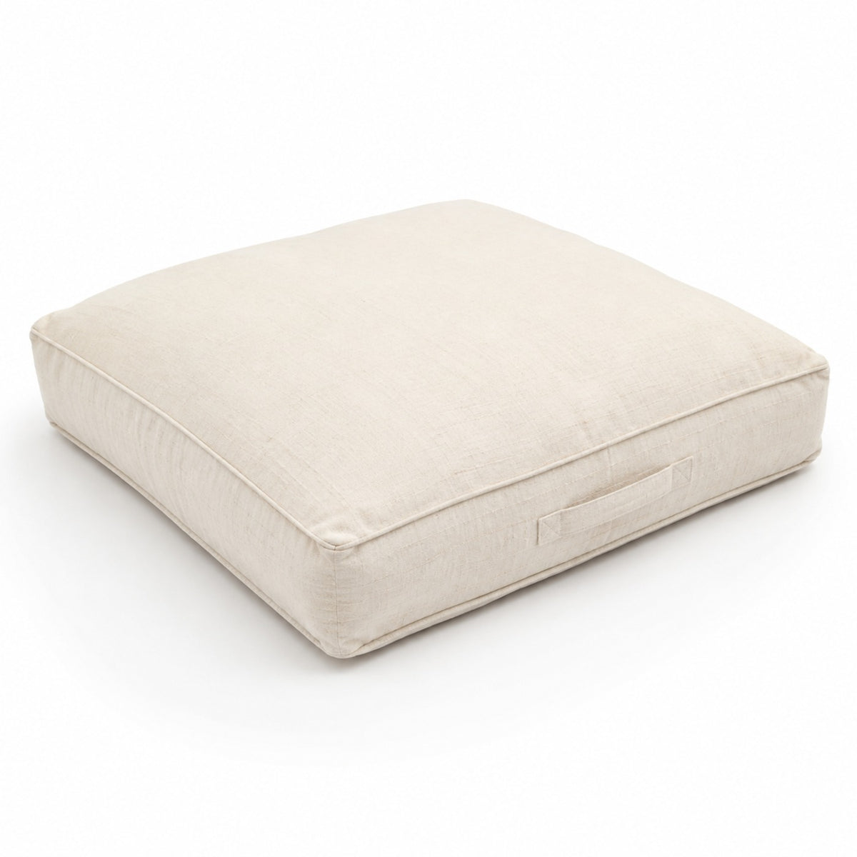 Soft ivory box-style floor cushion with stitched edge on white background