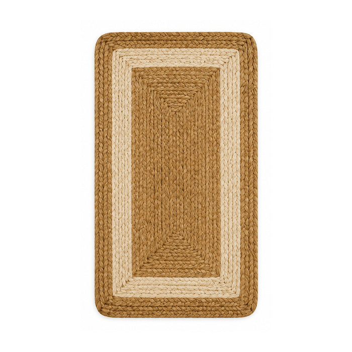 Tan and cream bordered braided jute bath mat on white background