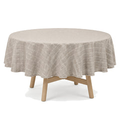 Primeval taupe cream grid tablecloth displayed on a round dining table
