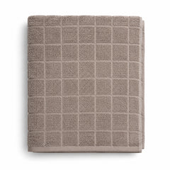Taupe grid textured cotton bath towel 70x140 cm on white background