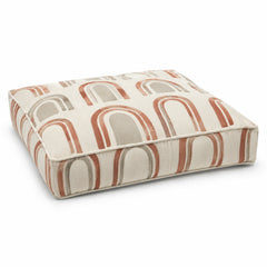 Ivory square floor cushion with terracotta and taupe arch print on white background