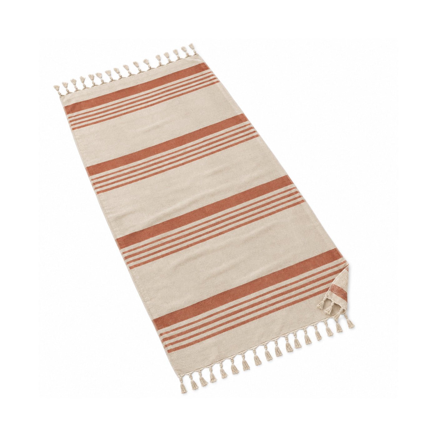 Terracotta and ivory horizontal striped fringed beach towel with a warm coastal style.