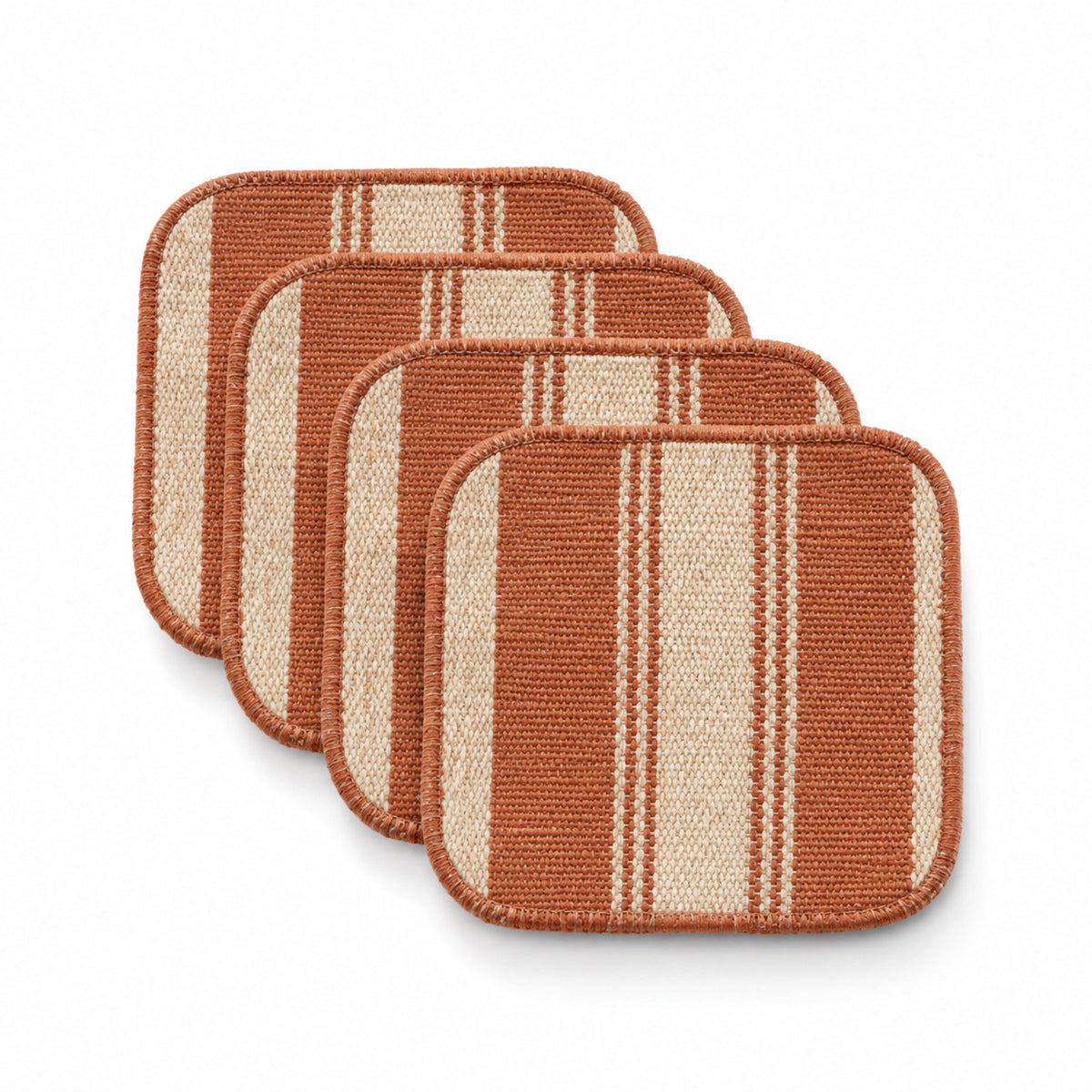 Terracotta and natural striped coaster set on a clean white background