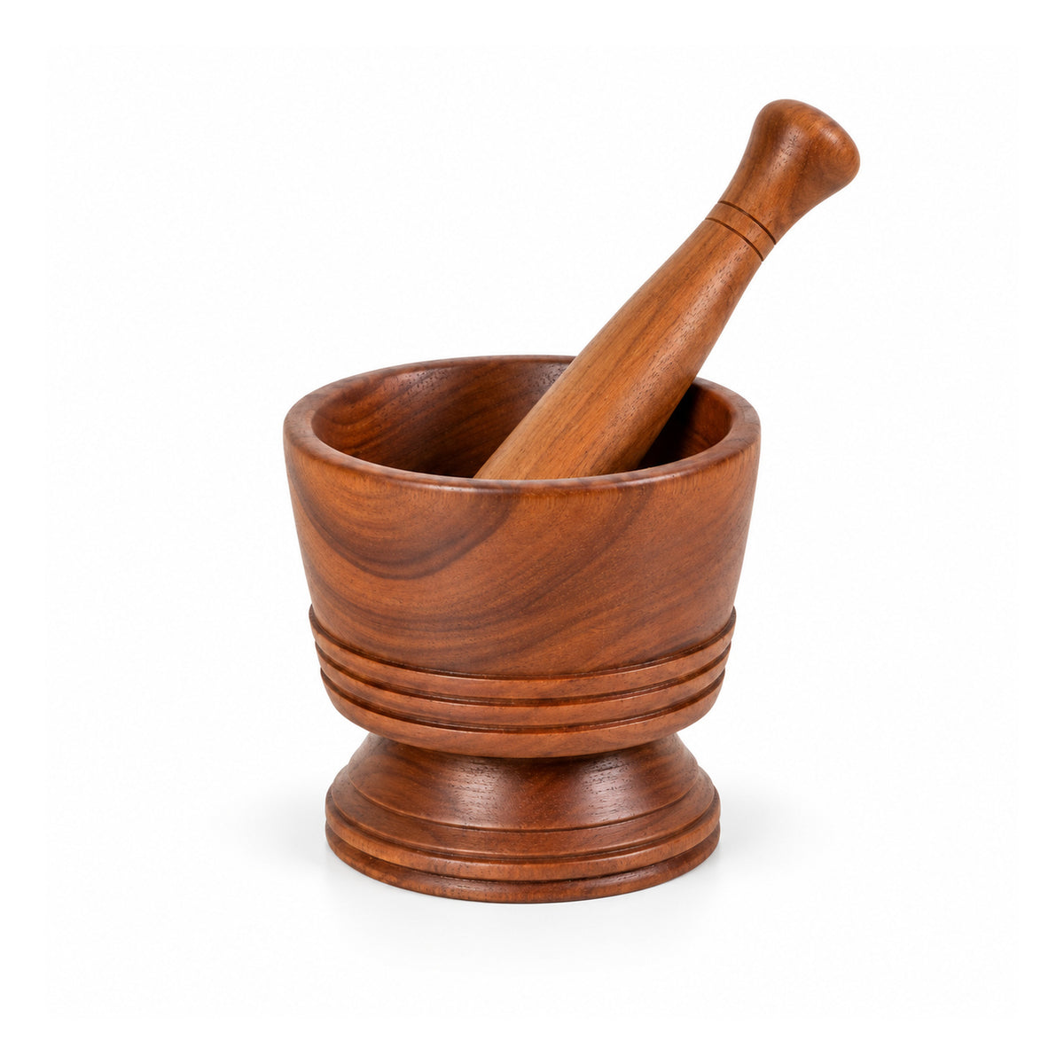 Reddish brown turned-wood mortar with raised groove details, pedestal base and long wooden pestle resting diagonally inside
