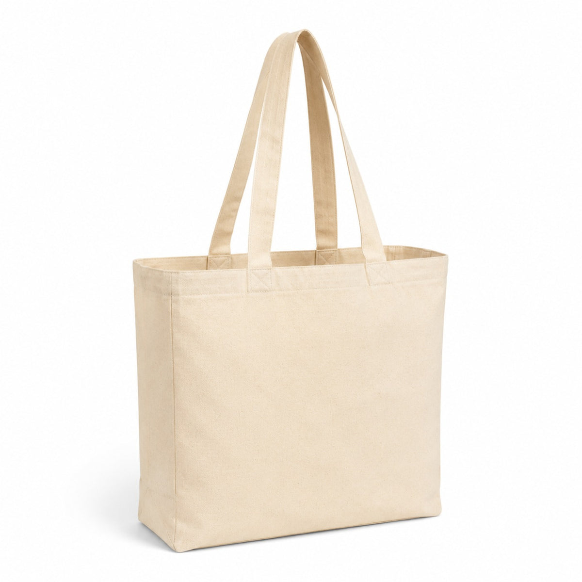 Warm cream cotton tote bag with a simple everyday shopper shape and long handles on a white background.