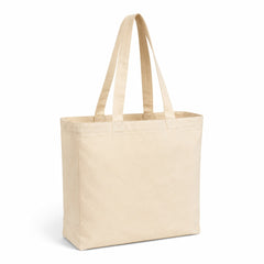 Warm cream cotton tote bag with a simple everyday shopper shape and long handles on a white background.