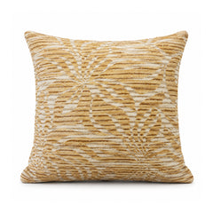 Primeval warm ochre gold and cream cushion cover with layered radiating abstract palm leaves and foliage motifs
