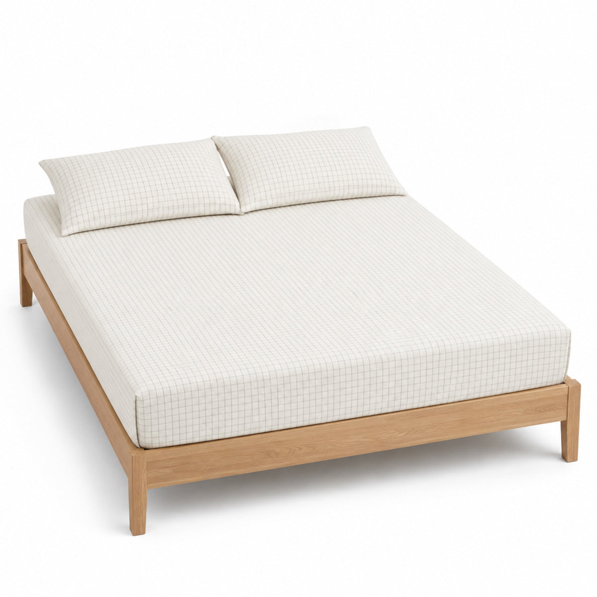 Warm white and grey micro-check bed sheet set with matching pillowcases on a wooden bed