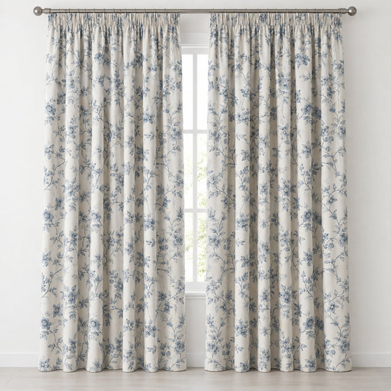 White blackout curtains with soft blue floral print, front product view - Primeval