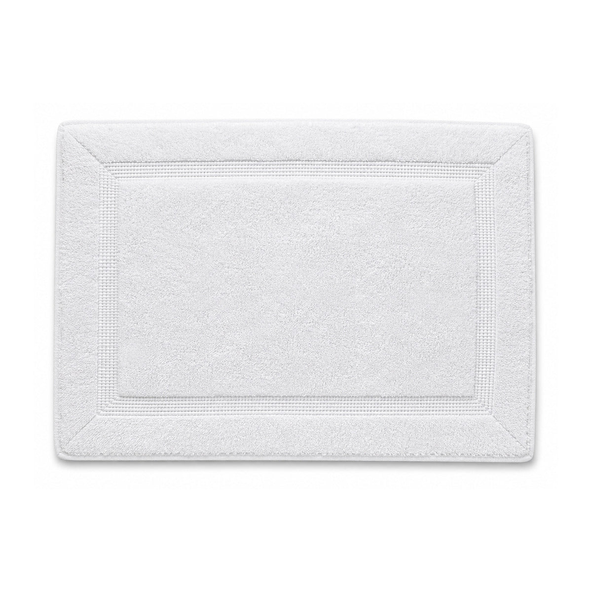 White framed spa bath mat with textured border on white background