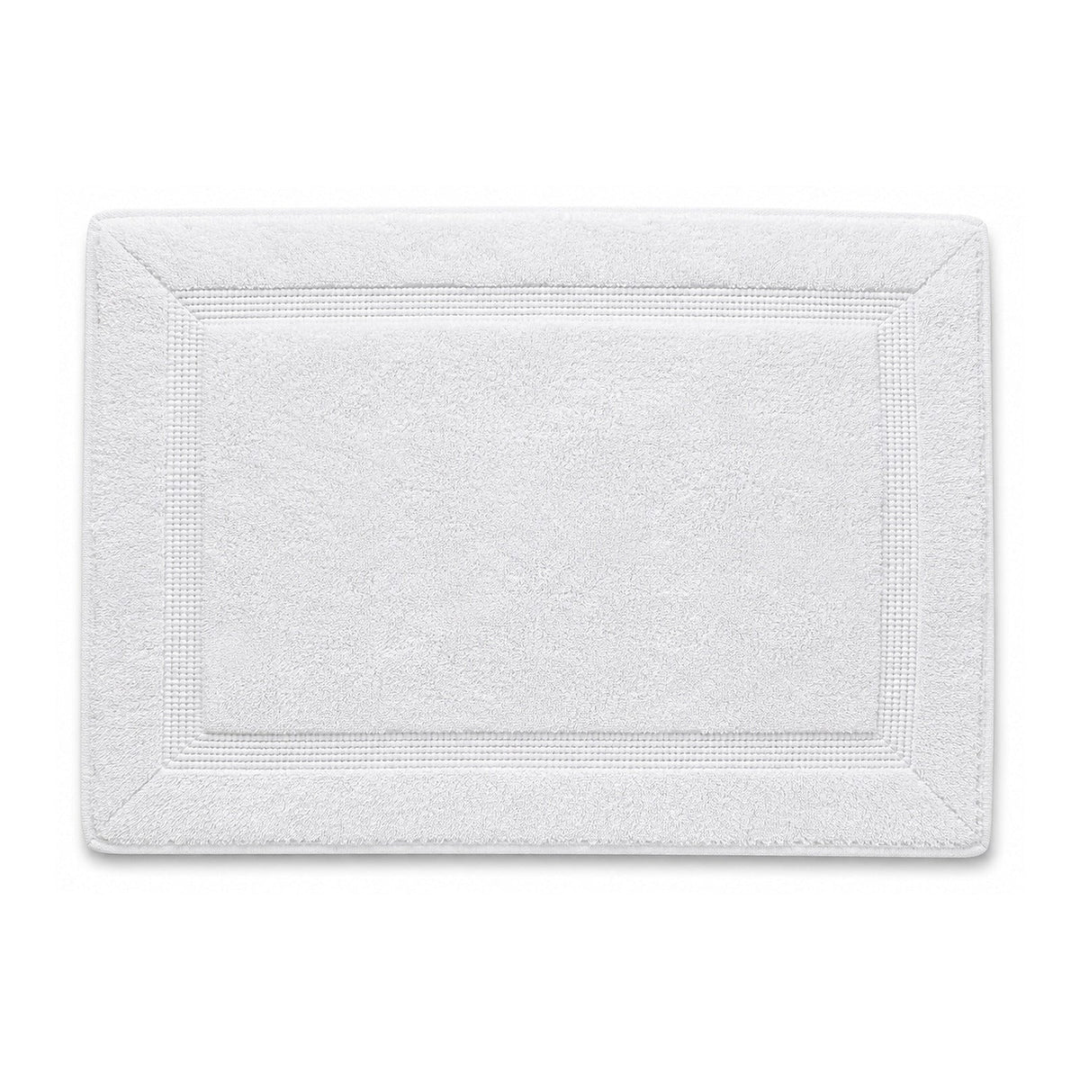 White framed spa bath mat with textured border on white background