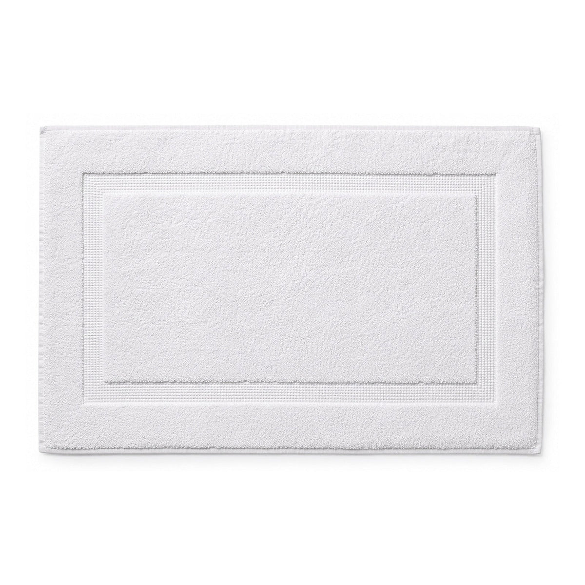 White hotel style bath mat with framed border on white background