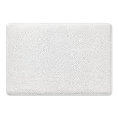 White plush textured bath mat for clean bathroom decor - Primeval