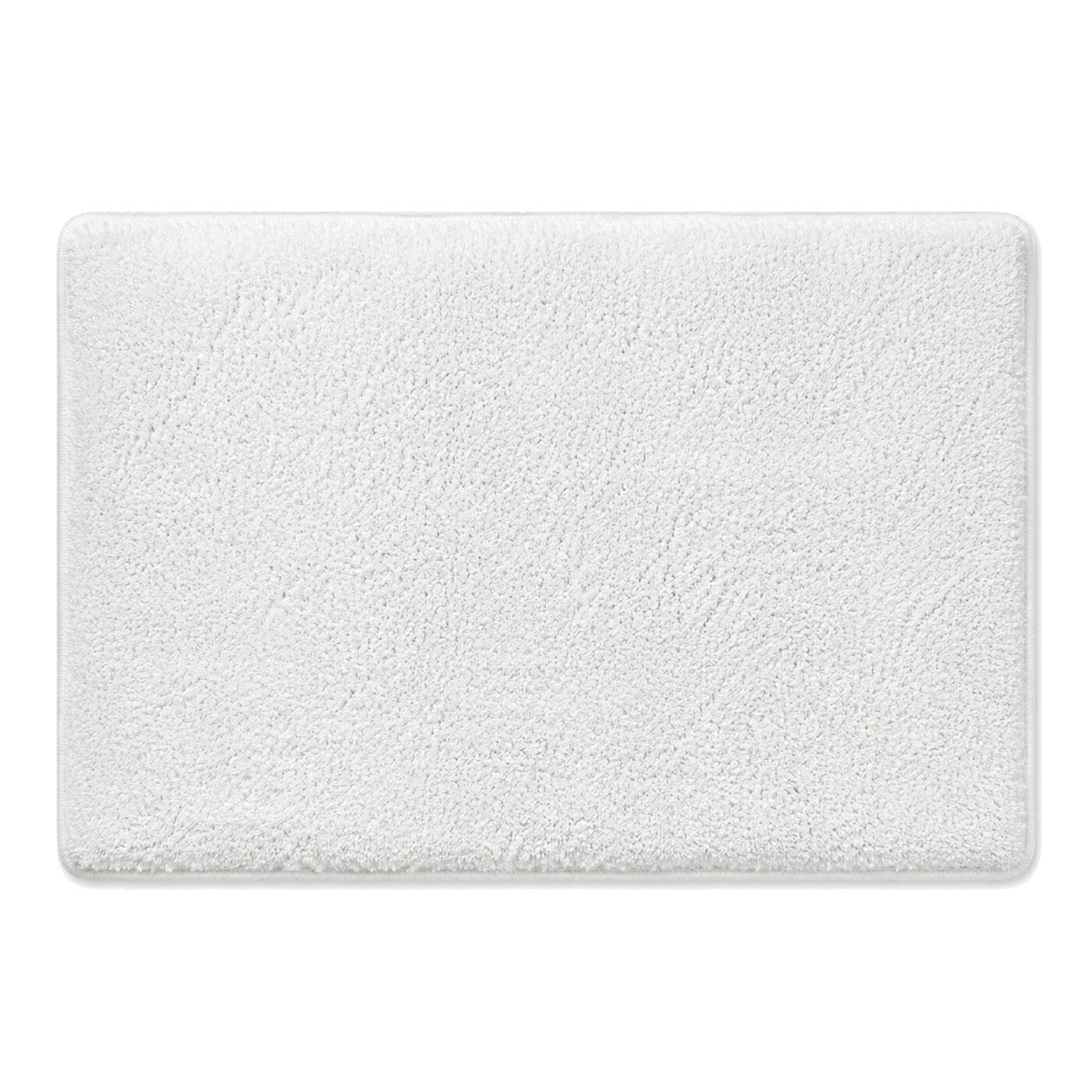 White plush textured bath mat for clean bathroom decor - Primeval