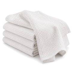 Primeval white waffle texture cotton kitchen towel set in folded studio presentation