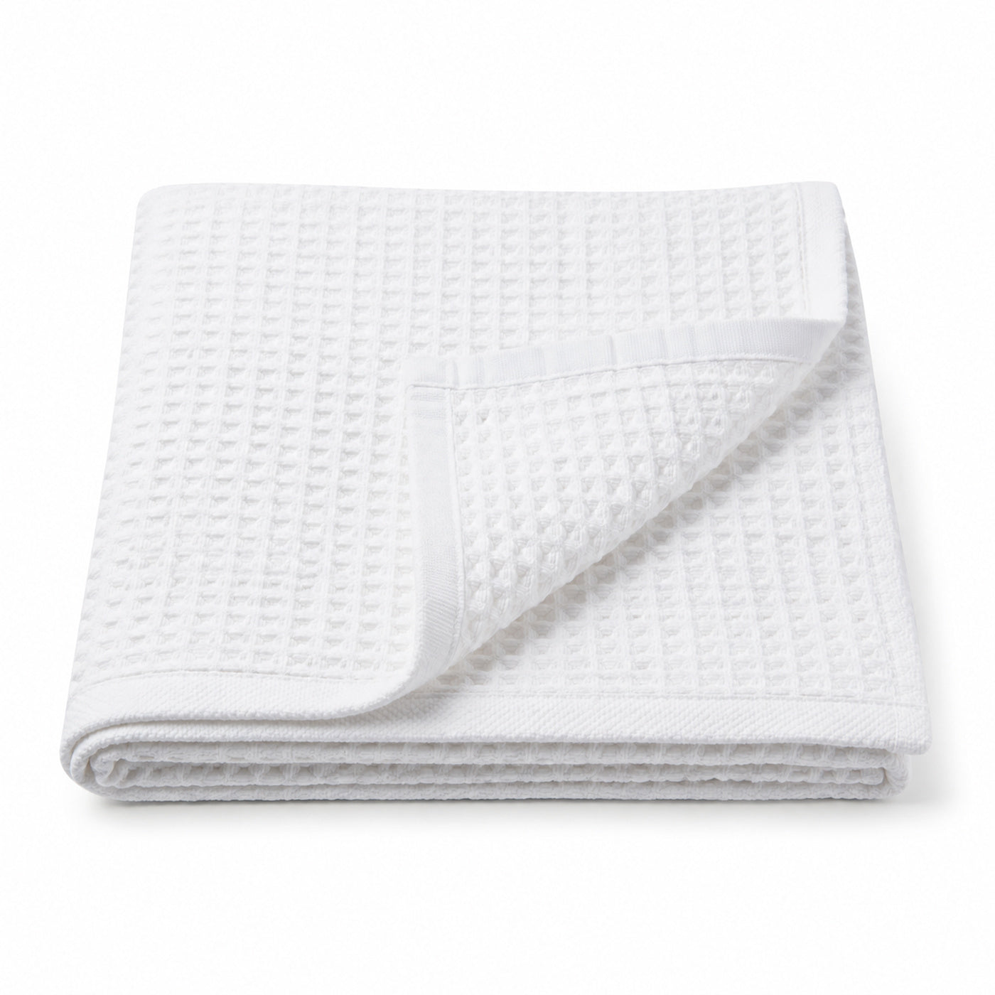 White waffle weave cotton bath towel 70x140 cm on white background