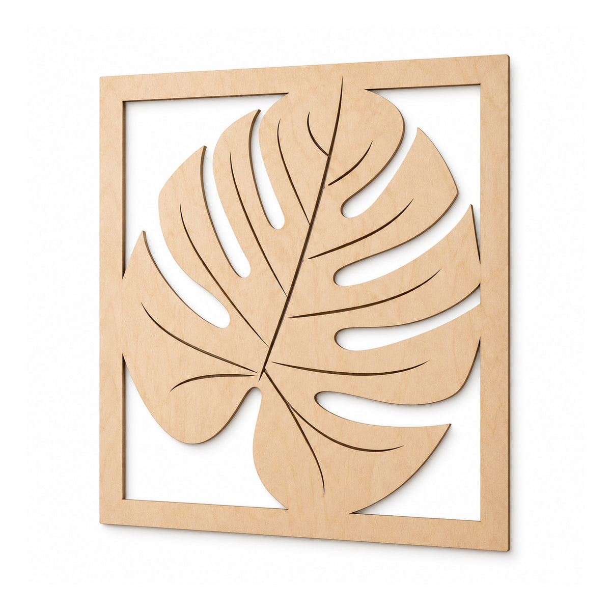 Square pale natural-wood wall art panel with a large split-leaf monstera design and open cutout slots within the frame