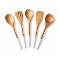 Five light golden-wood kitchen utensils with ivory-white handles, including spoons, fork and flat spatulas