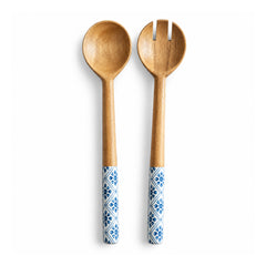 Wooden serving spoon and three-prong fork pair with natural wood heads and blue-and-white floral patterned handle grips