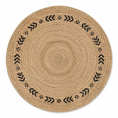 Natural round jute rug with matte black chevron detail for wholesale buyers